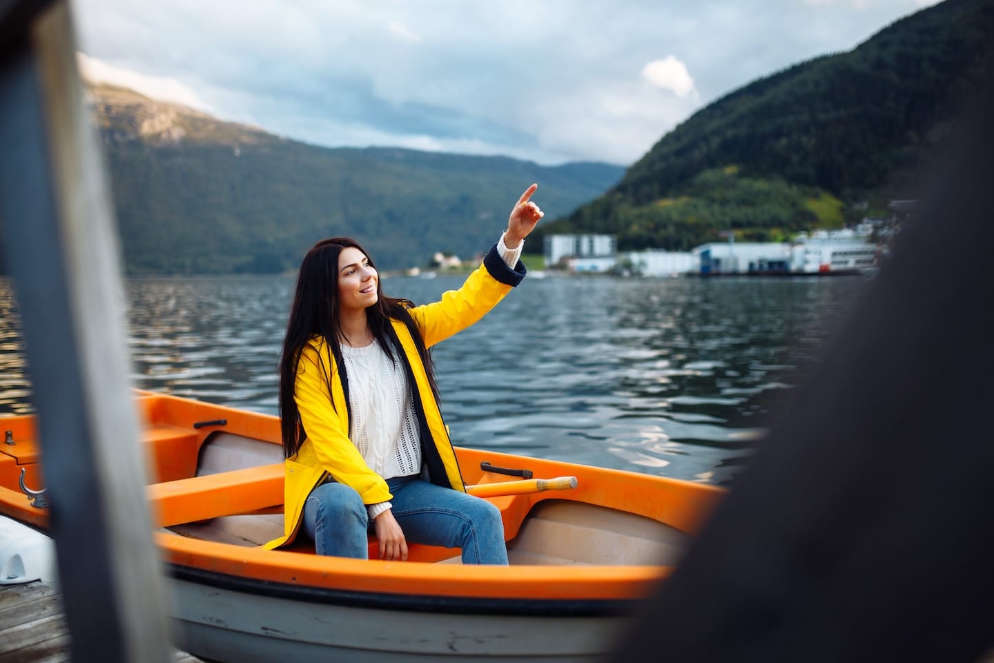 girl tourist in yellow jacket is sitting and posin 2023 11 27 05 12 29 utc